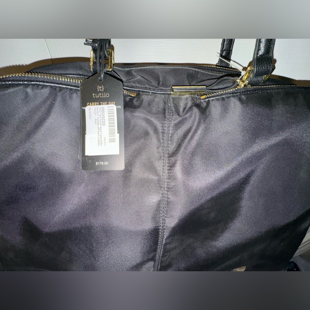 Tutilo black laptop bag or large purse, NWT. Still has original paper stuffing.